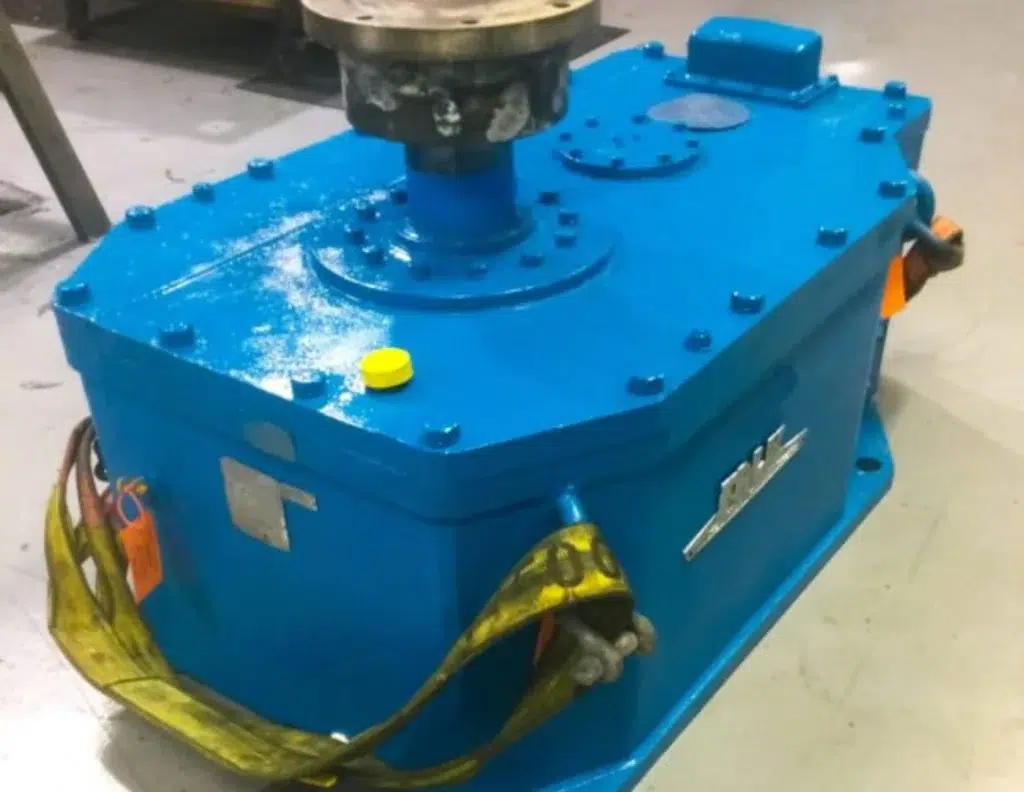 industrial gear reducer repair on factory floor