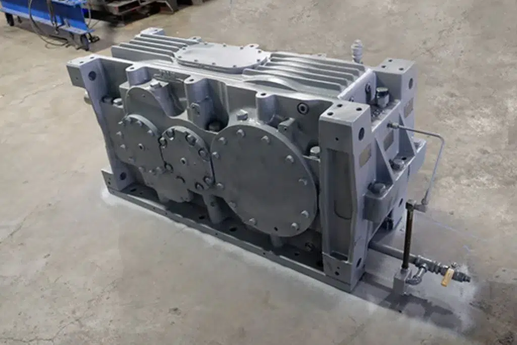 Industrial plant installation with shaft-mounted and flange-mounted gear reducer units